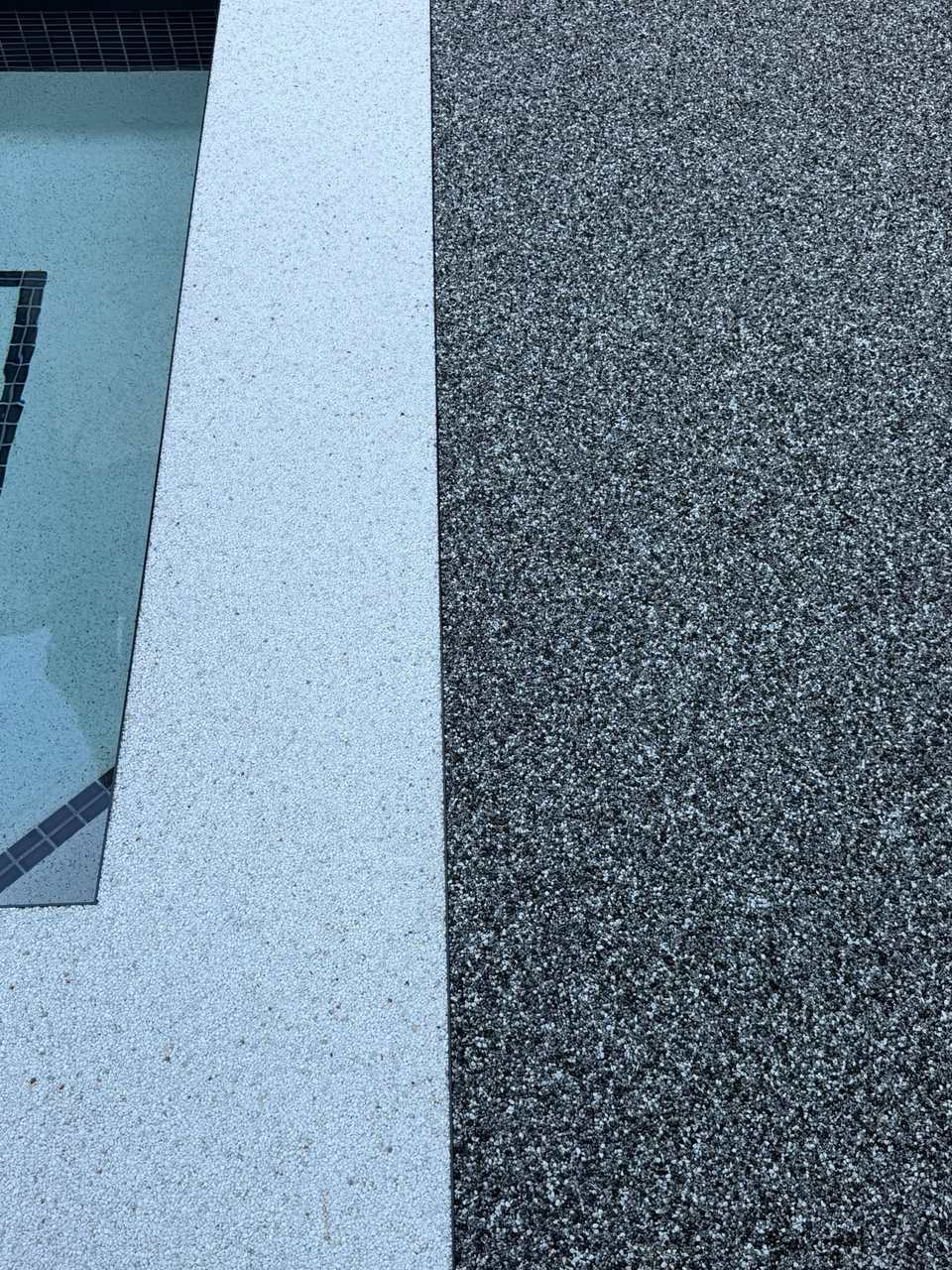 Quartz Granite Mix resin bound patio with white border in Ipswich — GC Resin Bound Surfaces