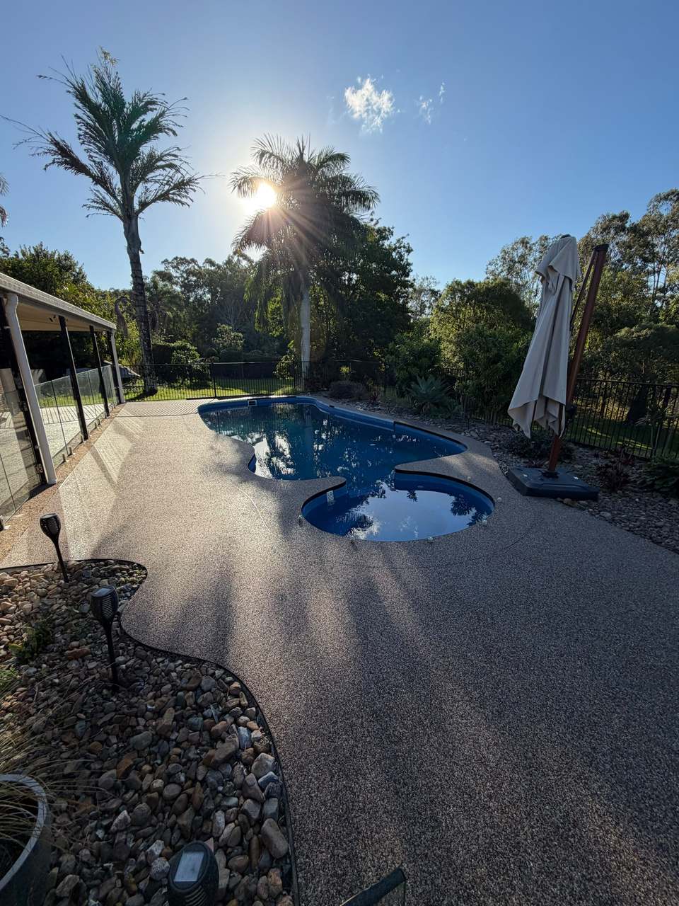 Tan resin pool surround